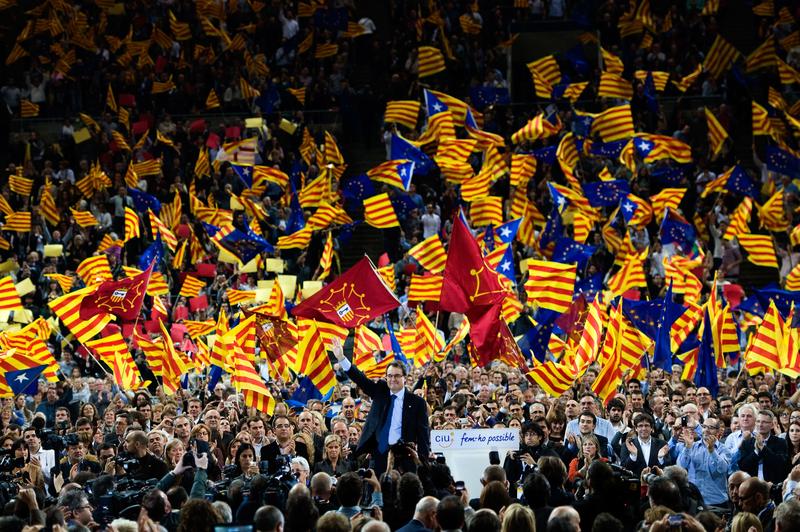 Artur Mas waves to supporters during the closing rally ahead of the Catalan Elections, at the Palau Sant Jordi on November 23, 2012 in Barcelona, Spain.