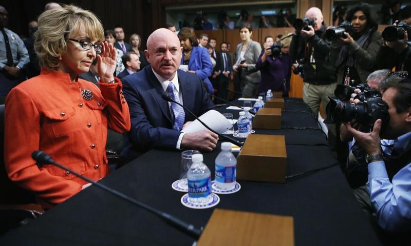 Shooting victim and former U.S. representative Gabby Giffords arrives for a Senate Judiciary Committee hearing about gun control on January 30, 2013.