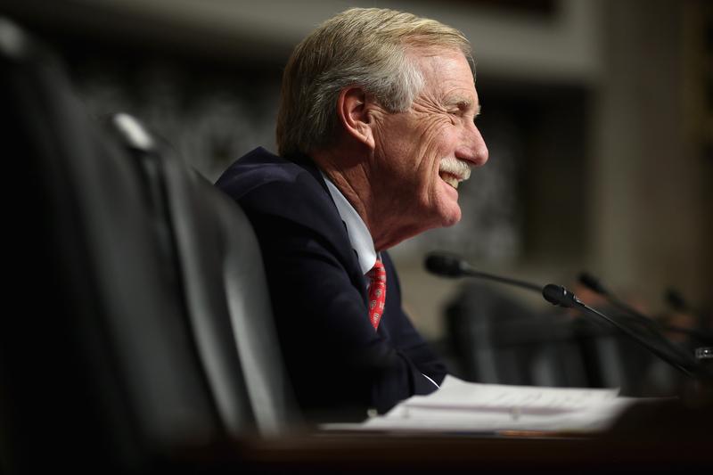 Senate Armed Services Committee member Sen. Angus King (I-ME) questions former U.S. Senator Chuck Hagel (R-NE) during his confirmation hearing to become the next secretary of defense on Capitol Hill.