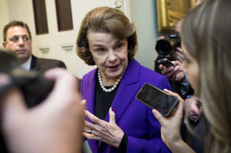 Senate Intelligence Committee chair Sen. Dianne Feinstein, D-Calif., leaves the Senate floor after speaking about the CIA torture report being released by the committee on Tuesday, Dec. 9, 2014.
