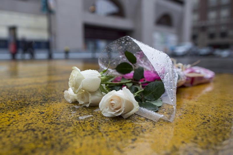 Flowers placed on the Boston Marathon finish line on Boylston St. on April 8, 2015, the day Dzhokhar Tsarnaev, 21, was found guilty on all 30 counts related to his involvement in the 2013 bombings.