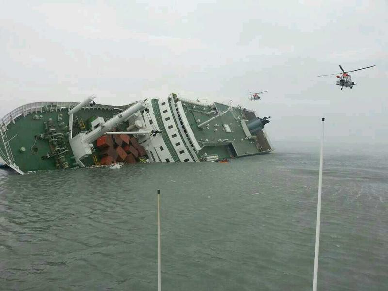 In this handout image provided by the Republic of Korea Coast Guard, a passenger ferry sinks off the coast of Jindo Island on April 16, 2014 in Jindo-gun, South Korea.