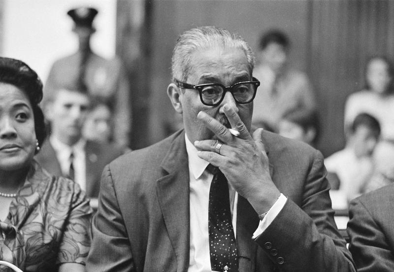 Thurgood Marshall, solicitor general of the U.S., has a smoke during a Senate hearing on his fitness to be appointed to the U.S. Supreme Court in Washington, July 19, 1967.