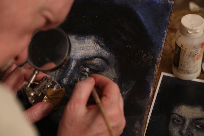 Mark Landis at home and at work on a “Picasso,” from the documentary "Art & Craft.
