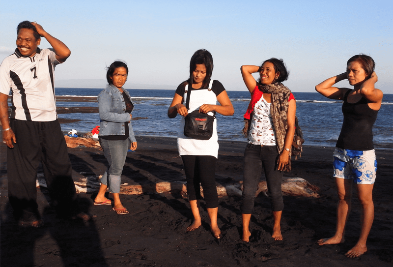 Darma and his four wives at the beach from Robert Lemelson's documentary "Bitter Honey"