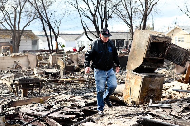 Several days after Sandy burned down more than 100 homes in Breezy Point, residents continued to pick through the rubble for belongings.