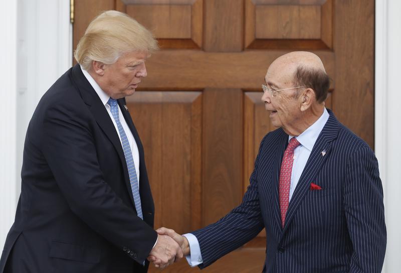 President-elect Donald Trump with billionaire investor Wilbur Ross, who he's nominated for commerce secretary.