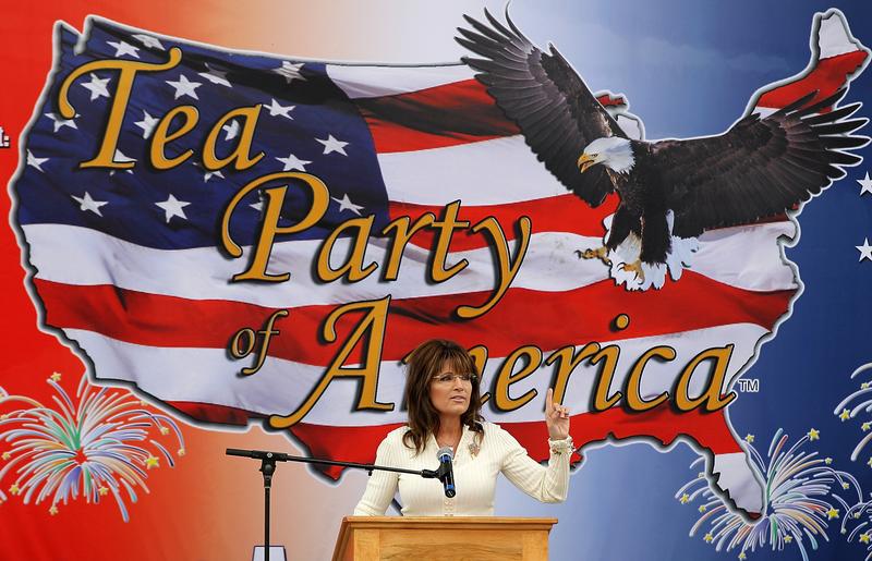 Former Alaska governor Sarah Palin speaks during the Tea Party of America's 'Restoring America' event at the Indianola Balloon Festival Grounds on September 3, 2011 in Indianola, Iowa.