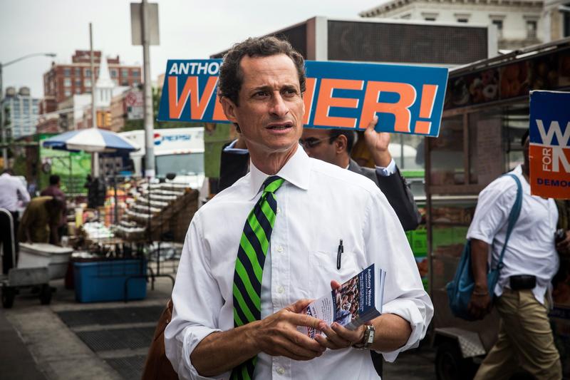 Anthony Weiner meets with voters on a street corner in Harlem in 2013.