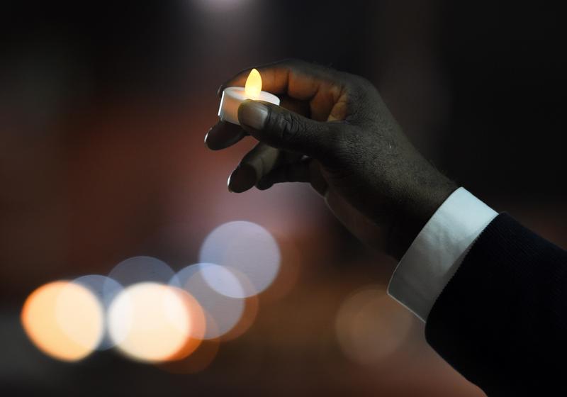 Members of a coalition of local activists, church groups and community leaders try to promote peace amongst rival street gangs in Los Angeles, California on August 14, 2015.