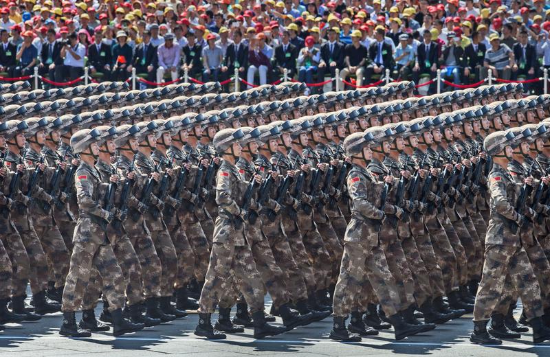 Chinese soldiers march in formation passed Tiananmen Square and the Forbidden City during a military parade on September 3, 2015 in Beijing, China.