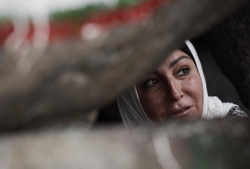 A Muslim pilgrim visits the Hiraa cave on Noor mountain on September 19, 2015 as more than a million Muslims from around the world converge the holy city of Mecca for the annual hajj pilgrimage.