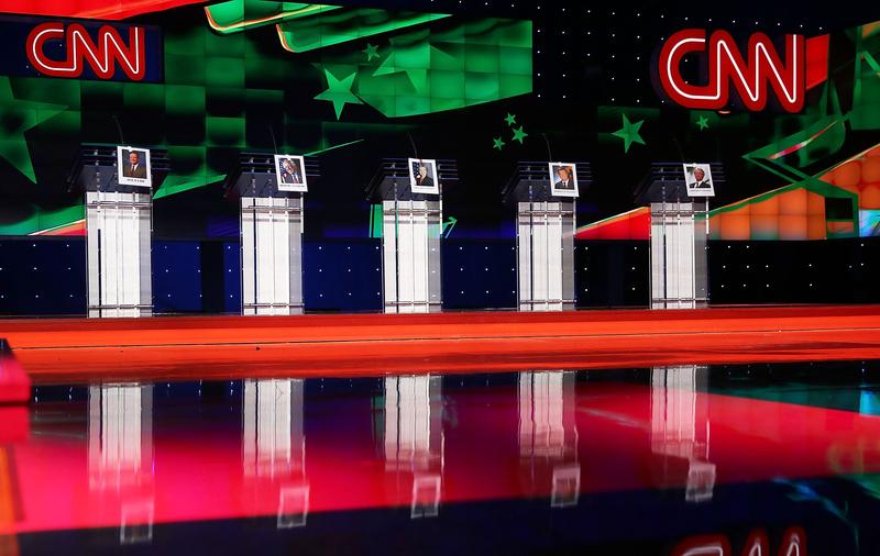 Photos of Democratic presidential candidates hang on their debate podiums a day before the CNN Facebook Democratic Debate at the Wynn Las Vegas on October 12, 2015 in Las Vegas, Nevada.