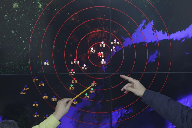 Officials in South Korea point to areas of seismic activity in North Korea on January 6, 2016.