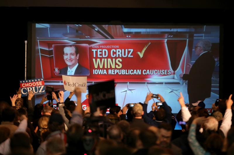 People cheers as Republican presidential candidate Sen. Ted Cruz (R-TX) is declared the winner at the caucus night gathering at the Iowa State Fairgrounds on February 1, 2016 in Des Moines, Iowa.