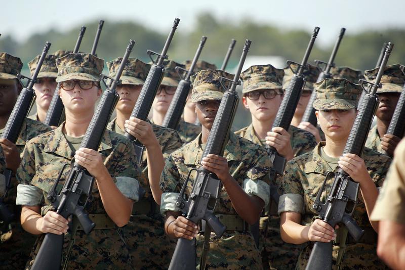 Female Marine Corps recruits pratice drill at the United States Marine Corps recruit depot June 22, 2004 in Parris Island, South Carolina.