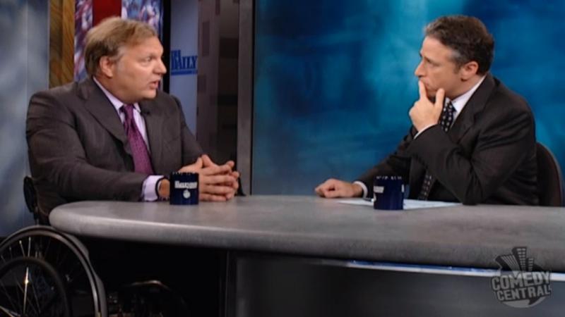 John Hockenberry with Jon Stewart on The Daily Show.