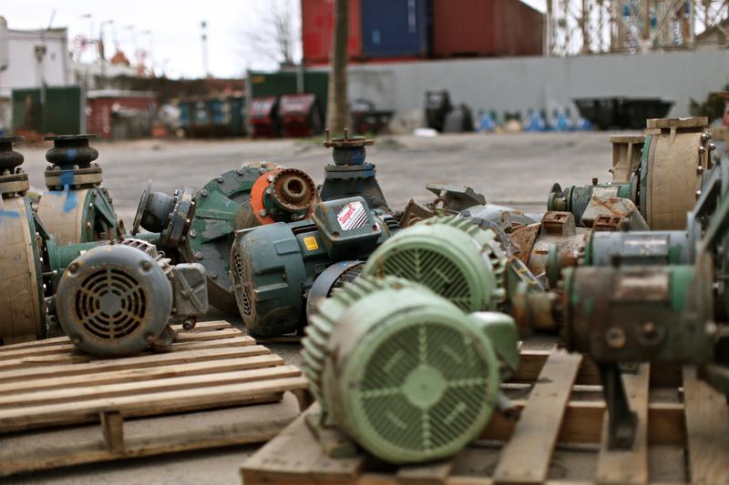 Pumps, motors and filters that were ruined when Sandy flooded the New York Aquarium are arranged in a former parking lot.