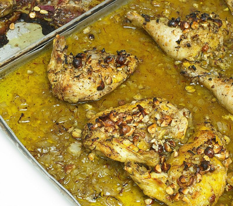 Roast chicken with saffron, from Ottolenghi: The Cookbook by Yotam Ottolenghi & Sami Tamimi, copyright © 2013. Published by Ten Speed Press, a division of Random House, Inc.