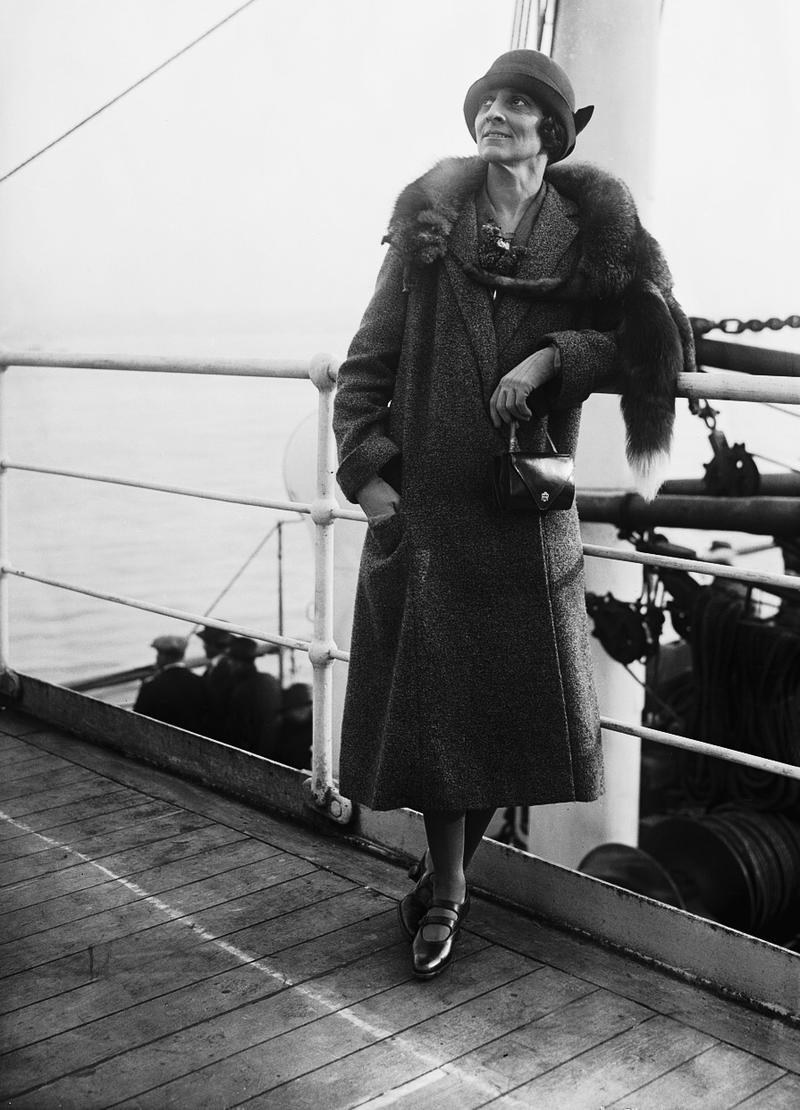 The actress Ruth Draper, posing on ship deck.