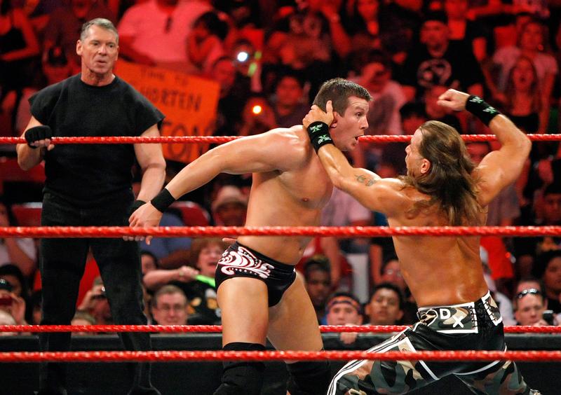 World Wrestling Entertainment Inc. Chairman Vince McMahon watches wrestlers Ted DiBiase and Shawn Michaels compete during the WWE Monday Night Raw show in Las Vegas, August 24, 2009.