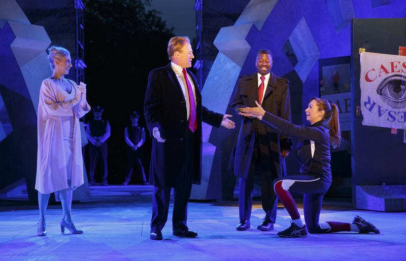 Tina Benko, left, portrays Melania Trump in the role of Caesar's wife, Calpurnia, and Gregg Henry, center left, portrays President Trump in the role of Julius Caesar.