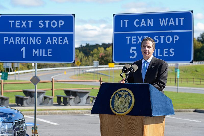 Gov. Cuomo with "Texting Zones" signage