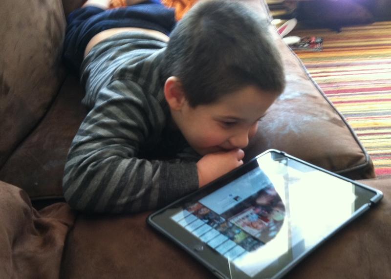 Five-year-old Quentin, who is autistic, uses an iPad to help him communicate