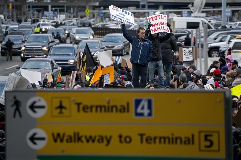 Protesters assemble at John F. Kennedy International Airport after President Donald Trump signed an executive order suspending all immigration from seven Muslim-majority countries in late January.