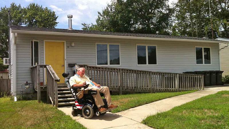Richard West uses a long ramp just to reach his front door. (Tracey Samuelson/for NewsWorks)