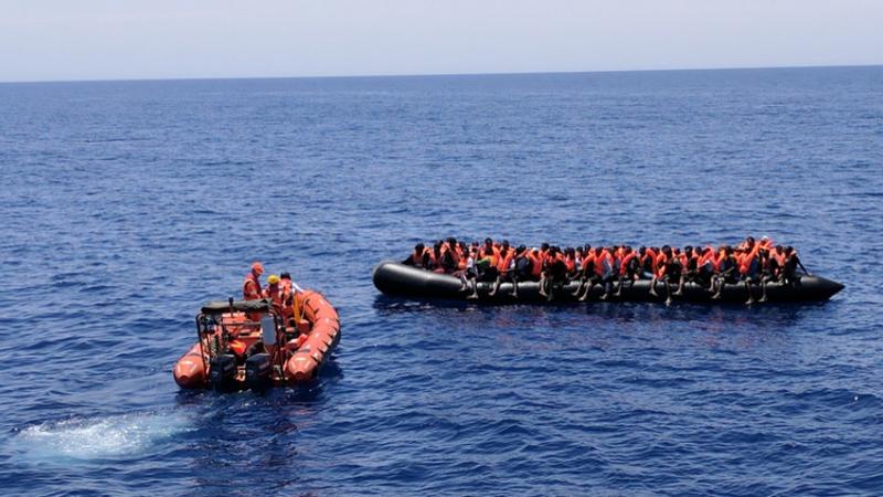 Save the Children workers rescue migrants on a boat in the Mediterranean off the coast of Libya on May 23, on one of the group's biggest single-day rescue hauls so far in 2017.