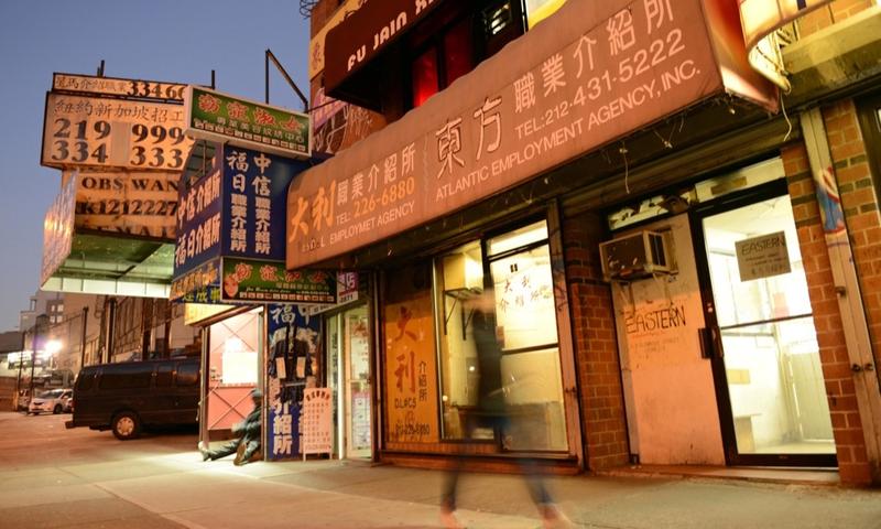 Chinatown is dotted with dozens of employment agencies and salons like these two operating next door to each other here.