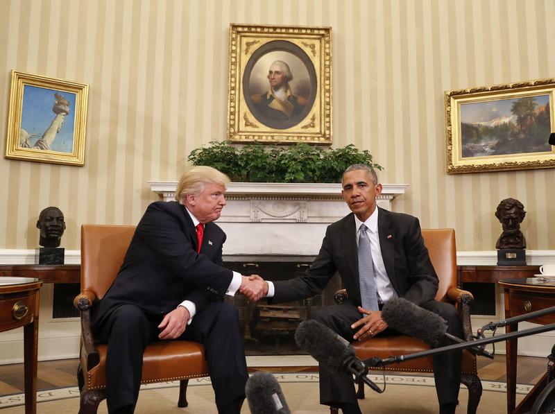 President Barack Obama and President-elect Donald Trump shake hands following their meeting in the Oval Office of the White House in Washington, Thursday, Nov. 10, 2016.