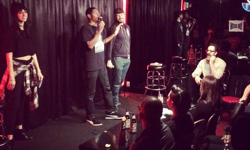 Host Brian Moses stands between two warring comics at the Comedy Store's Roast Battle