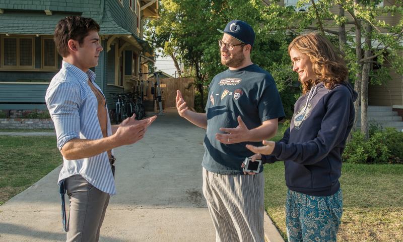 (Left to right) Zach Efron, Seth Rogen, and Rose Byrne in <em>Neighbors</em>