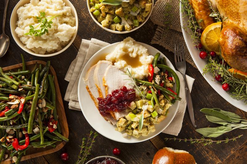 Homemade Thanksgiving turkey with stuffing and potatoes.