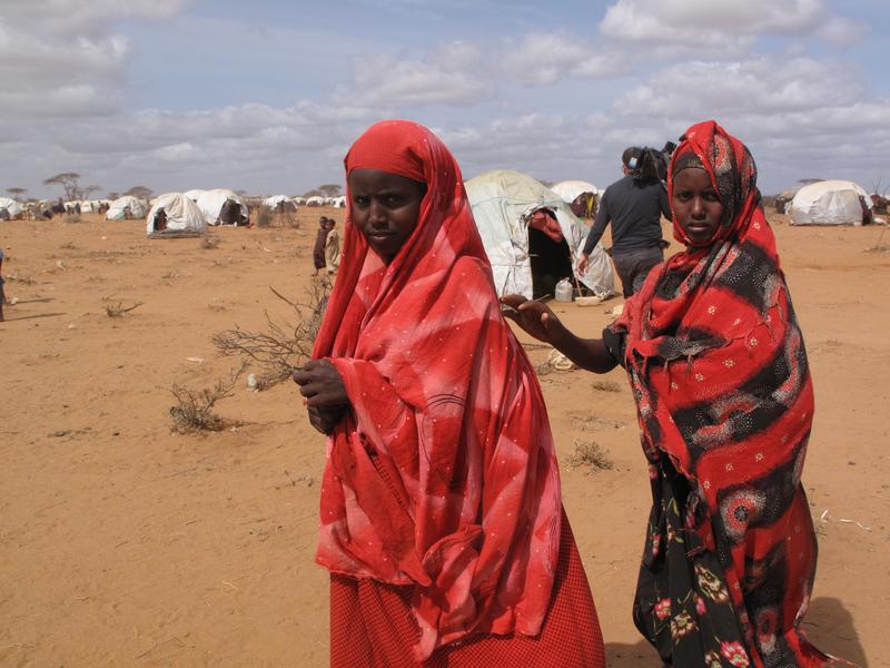 Unidentified woman & children live in the Dadaab refugee camp where thousands of Somalis wait for help. August 15, 2011 in Dadaab, Somalia.