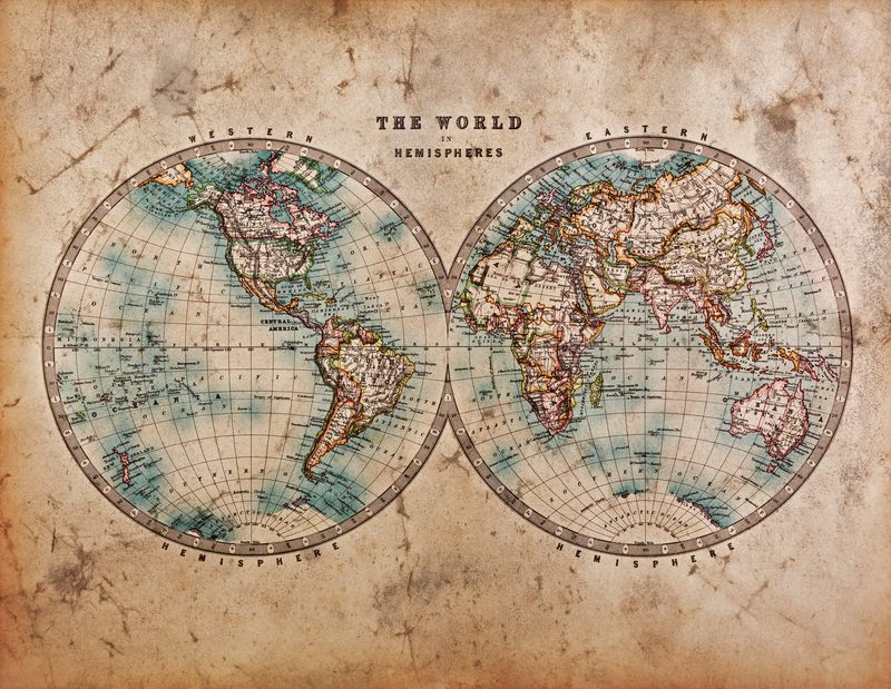 A world map dated from the mid 1800s showing Western and Eastern Hemispheres with hand colouring