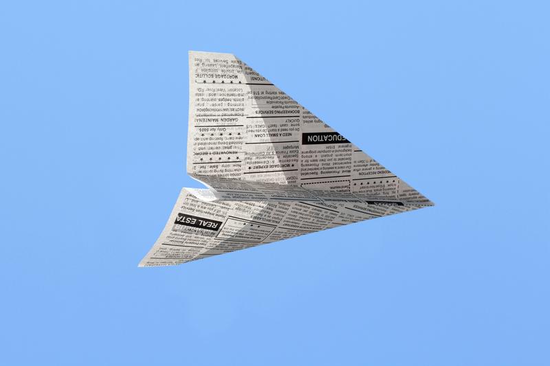 Newspaper paper airplane