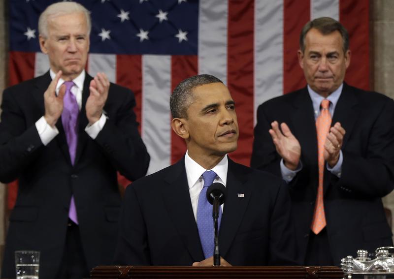 U.S. President Barack Obama, flanked by Vice President Joe Biden and House Speaker John Boehner (R-OH), delivers his State of the Union speech. Feb. 12, 2013