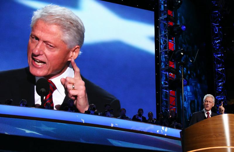 Former U.S. President Bill Clinton speaks on stage during day two of the Democratic National Convention.