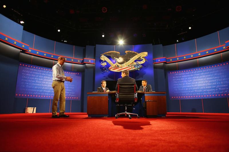 Stand-ins participate in a stage rehearsal a day ahead of the final presidential debate in Boca Raton.