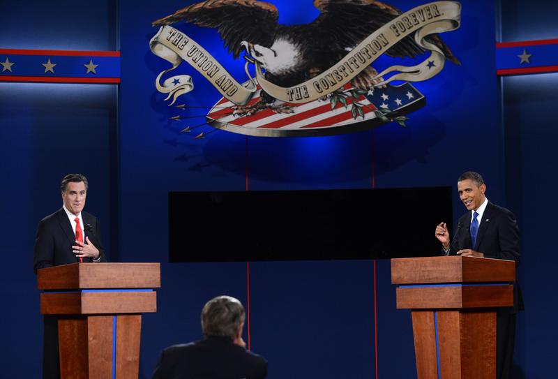 US President Barack Obama (R) and Republican presidential candidate Mitt Romney (L) participate in the first presidential debate at Magness Arena at the University of Denver in Denver, Colorado.