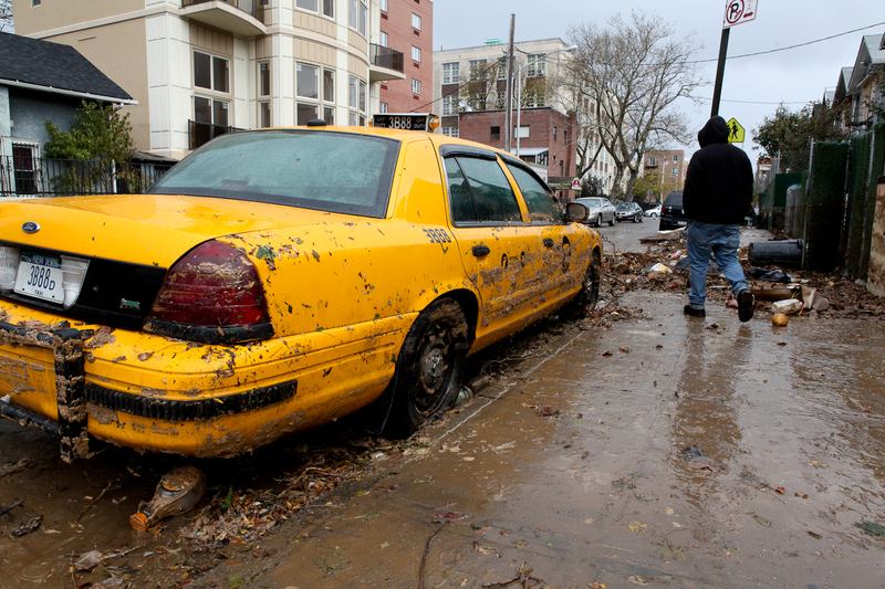 Destroyed taxi cab on Coney Island after Hurricane Irene