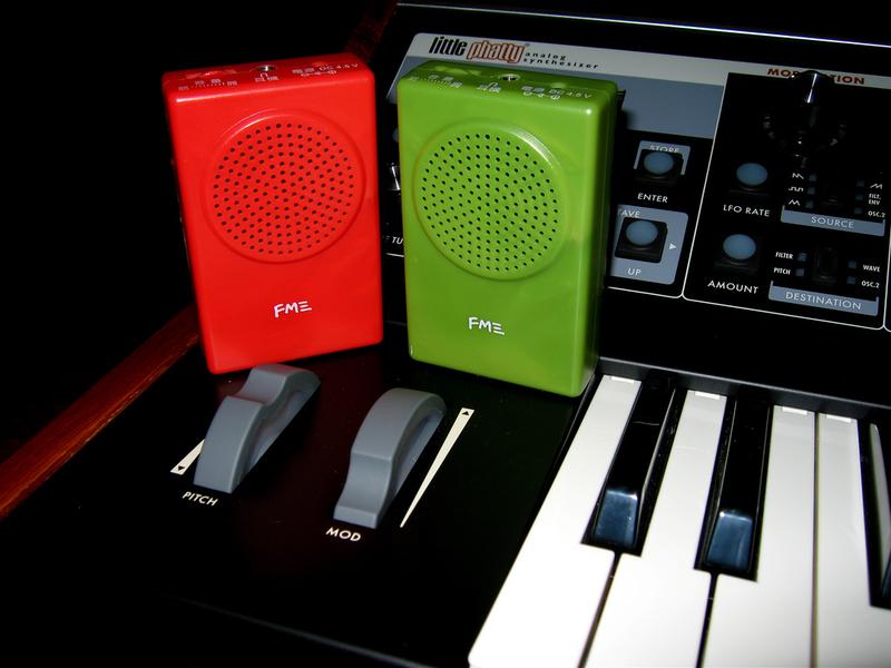Red, green, and black audio equipment