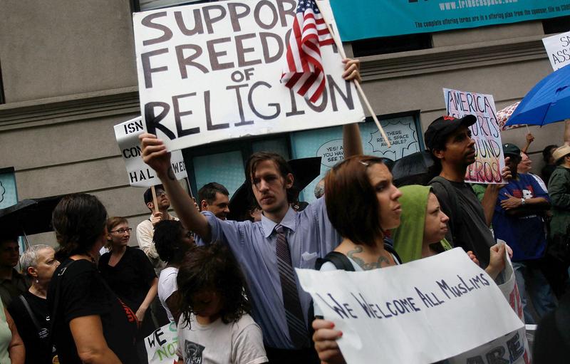 Supporters of a Islamic cultural center and mosque planned to be built near Ground Zero in lower Manhattan chant slogans and carry signs during a demonstration on August 22, 2010 in New York, NY.