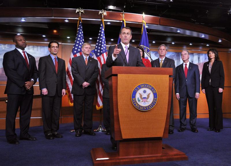 House Speaker-elect US Representative John Boehner (C) is surrounded by fellow Congressional members speaks at a press conference November 18, 2010 on Capitol Hill in Washington, DC.