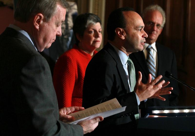 U.S. Rep. Luis Gutierrez (D-IL) (2nd R) speaks as Sen. Richard Durbin (D-IL), Secretary of Homeland Security Janet Napolitano, and Rep. Howard Berman (D-CA) listen during a conference on the DREAM Act