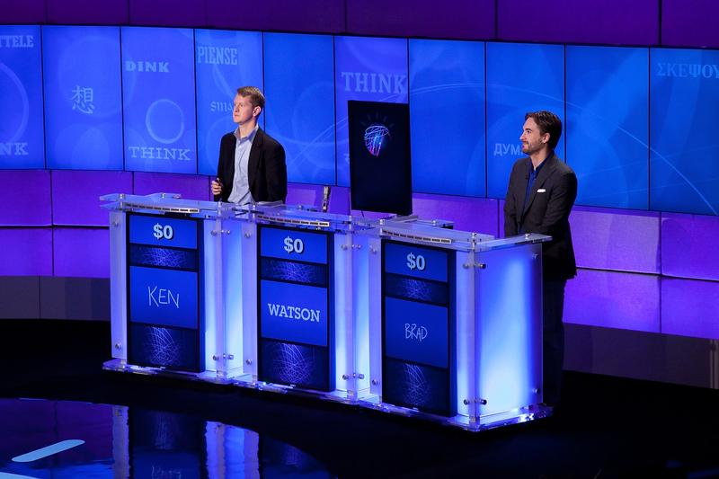 Contestants Ken Jennings and Brad Rutter compete against 'Watson' at a press conference to discuss the upcoming Man V. Machine 'Jeopardy!' competition.