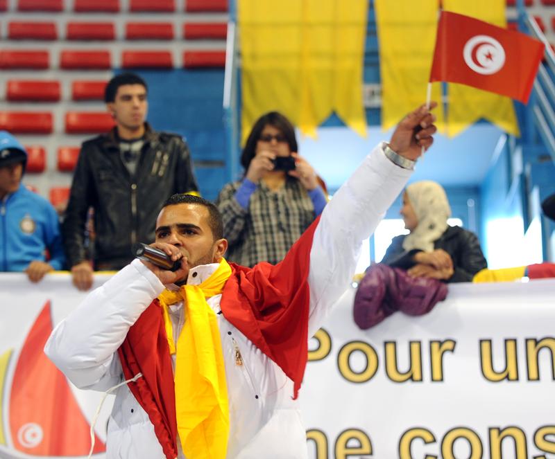 Tunisian rap singer Hamada Ben Amor, also knows as ''The General'' performs during the first meeting of the Tunisia'smain PDP opposition party on January 29, 2011 in Tunis.